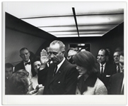 Cecil W. Stoughtons Personal, Unpublished 10 x 8 Photo of LBJs Inauguration Aboard Air Force One -- LBJ Takes the Oath of Office as a Stunned Jackie Watches